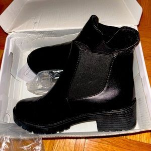 Black ankle boots never worn